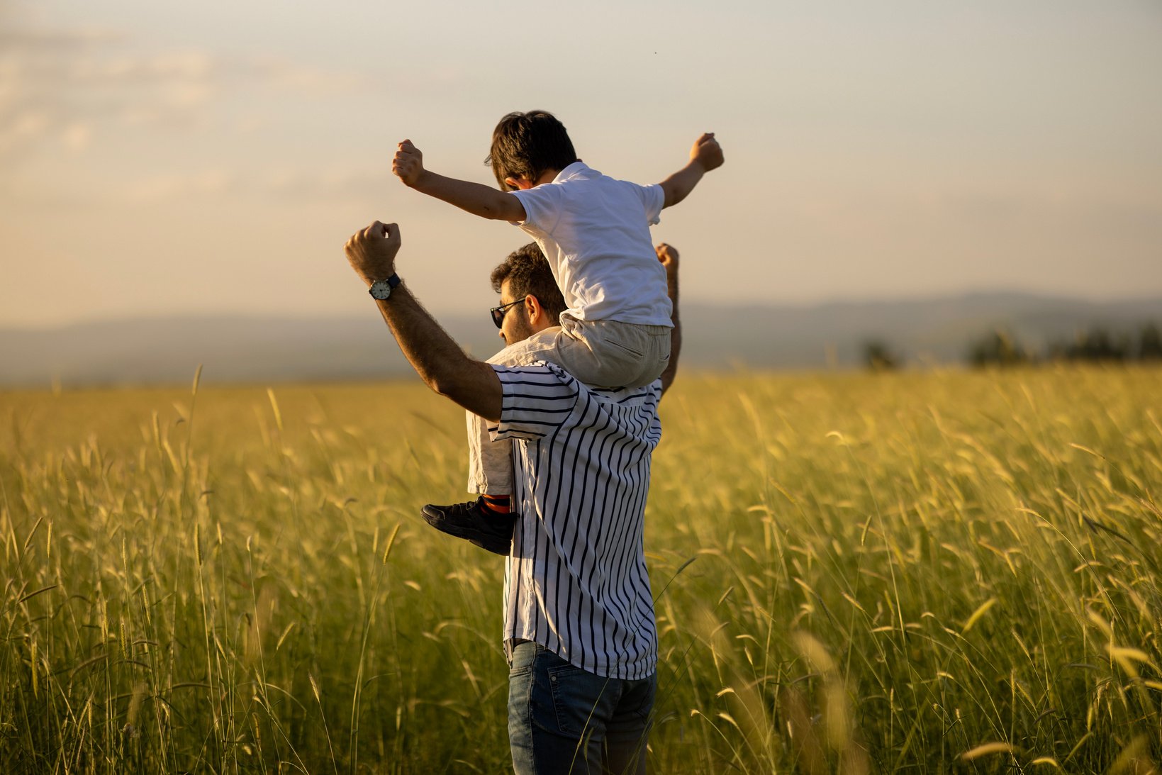 Dad and son outdoors